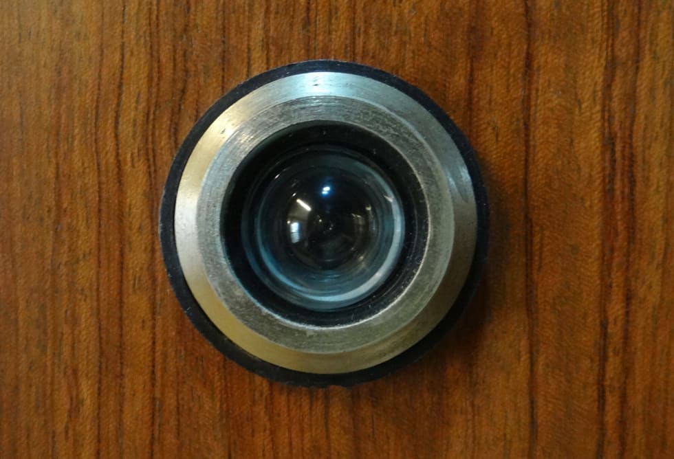 The Home Security Benefits of Installing a Front Door Peephole